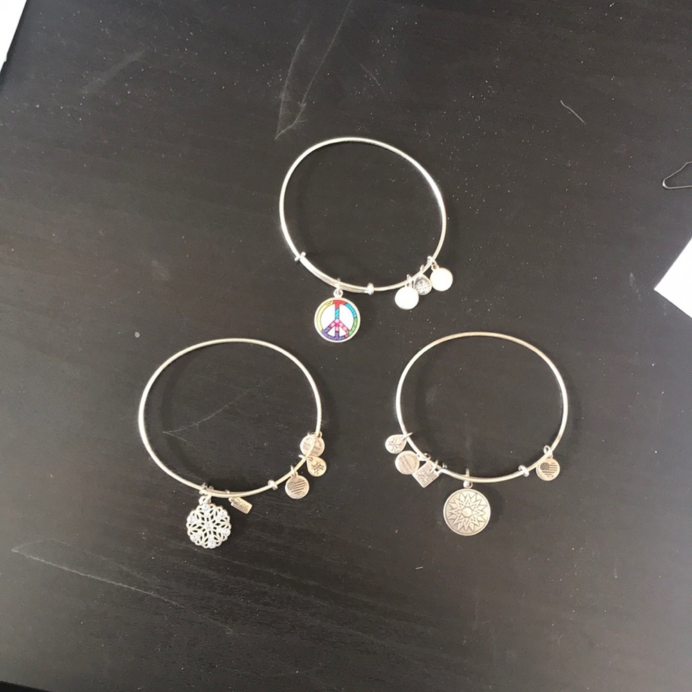 Three Alex & Ani bracelets